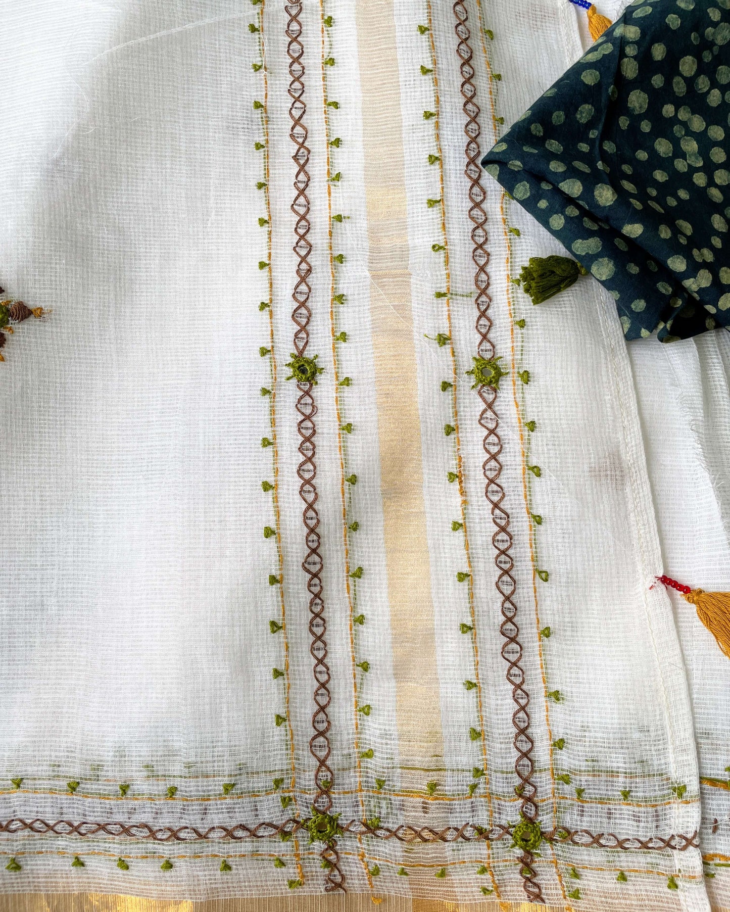 White Kota cotton with green embroidery